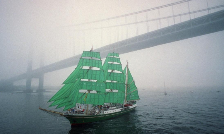 The German sailing ship Alexander von Humboldt, passes the George Washington Bridge on the Hudson River on July 4, 1992, as a part of the celebration of the 500th anniversary of Columbus's voyage to America. (Mark Lennihan/AP)